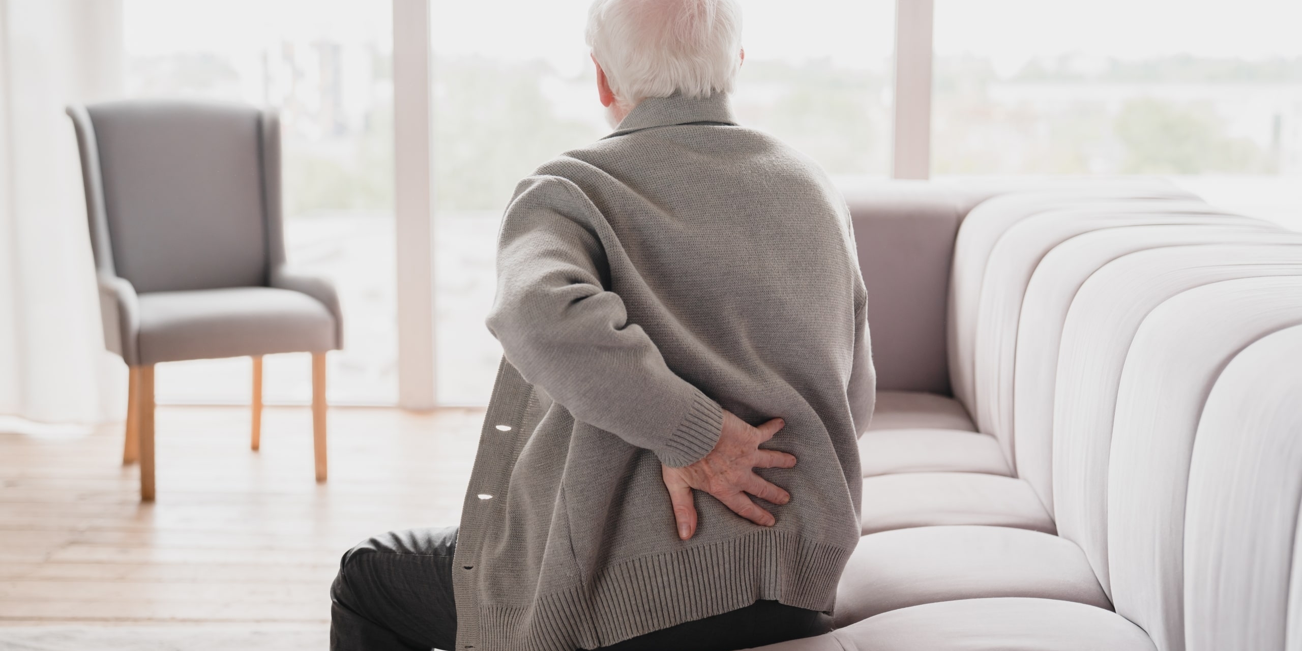 Senior,old,elderly,man,grandfather,touching,his,back,,suffering,from